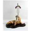 Image 1 : A PORCELAIN FIGURAL OF A RECLINING WALRUS