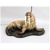 Image 2 : A PORCELAIN FIGURAL OF A RECLINING WALRUS