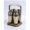 Image 1 : A NAPIER SILVER-PLATED AND WOOD-HANDLED CADDY WITH FOUR SILVER-PLATED COCKTAIL SHAKERS
