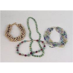 FOUR BEADED NECKLACES