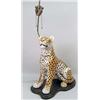 Image 1 : A LARGE PORCELAIN FIGURAL OF A SEATED LEOPARD