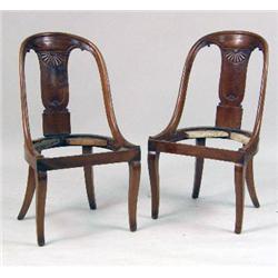 A PAIR OF REGENCY CARVED MAHOGANY SIDE CHAIRS