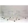 Image 1 : FOUR LUCITE ROLLING STANDS