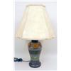 Image 1 : AN ARTS AND CRAFTS POLYCHROME CERAMIC TABLE LAMP WITH METAL MOUNTS