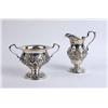 Image 1 : AN S. KIRK AND SON STERLING SILVER ALL-OVER REPOUSSE PATTERN FOOTED CREAM JUG AND OPEN SUGAR BOWL