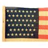 Image 2 : A 44-STAR AMERICAN FLAG ON CARVED WOODEN STANDARD