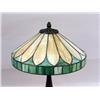 Image 2 : A TIFFANY-STYLE LEADED GLASS AND PATINATED METAL TABLE LAMP