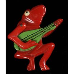 Bakelite Frog Playing Banjo with Movable Arm Pin.