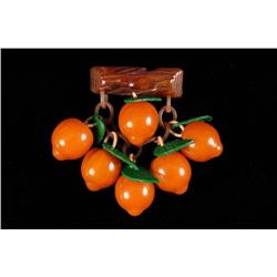 Bakelite Dangling Peaches Pin.
