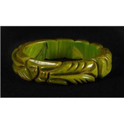 Bakelite Carved Bracelet with Oriental Figure.