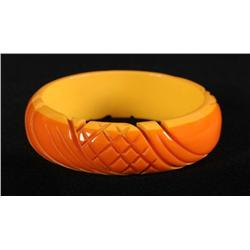 Bakelite Orange & Cream Carved Bracelet.