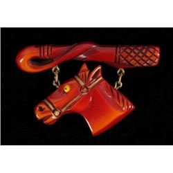 Bakelite Whip & Horse Pin.