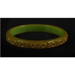 Bakelite Green Bracelet with Lifesaver Carvings.