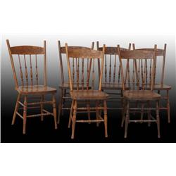 Lot of 6: Oak Pressed Back Spindle Chairs.
