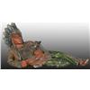 Image 1 : Reclining Indian Figure Holding Pipe.