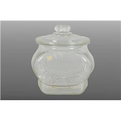 Planters Peanut Embossed Football Jar with Lid.