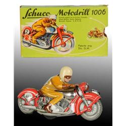 Tin Schuco Motodrill Motorcycle Wind-Up Toy.