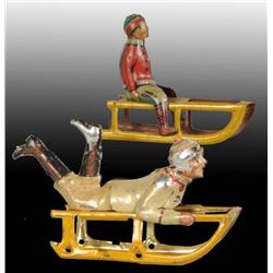 Lot of 2: Tin Sled Penny Toys.