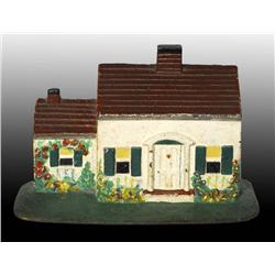 Cast Iron Cottage Doorstop.