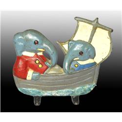 Cast Iron Babar and Arthur in a Boat Doorstop.