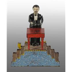 Cast Iron Magician Mechanical Bank.