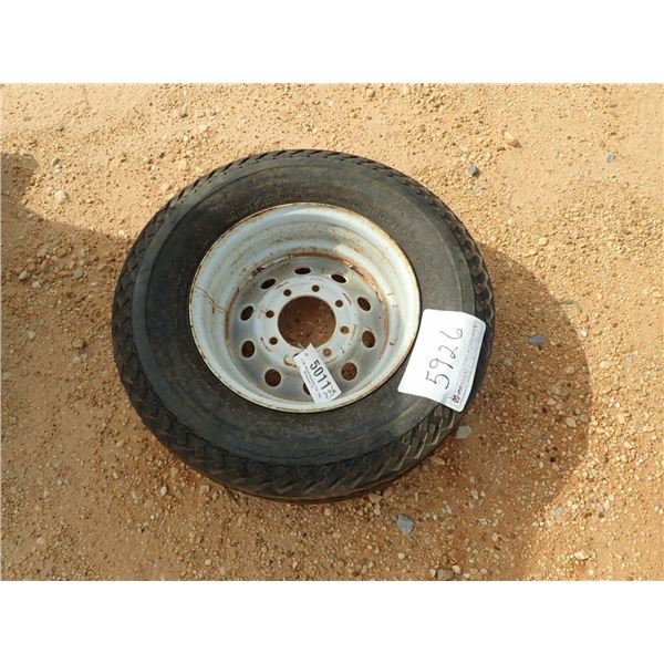 (1) 9.5 X 16.5 TIRE & RIM (A2)