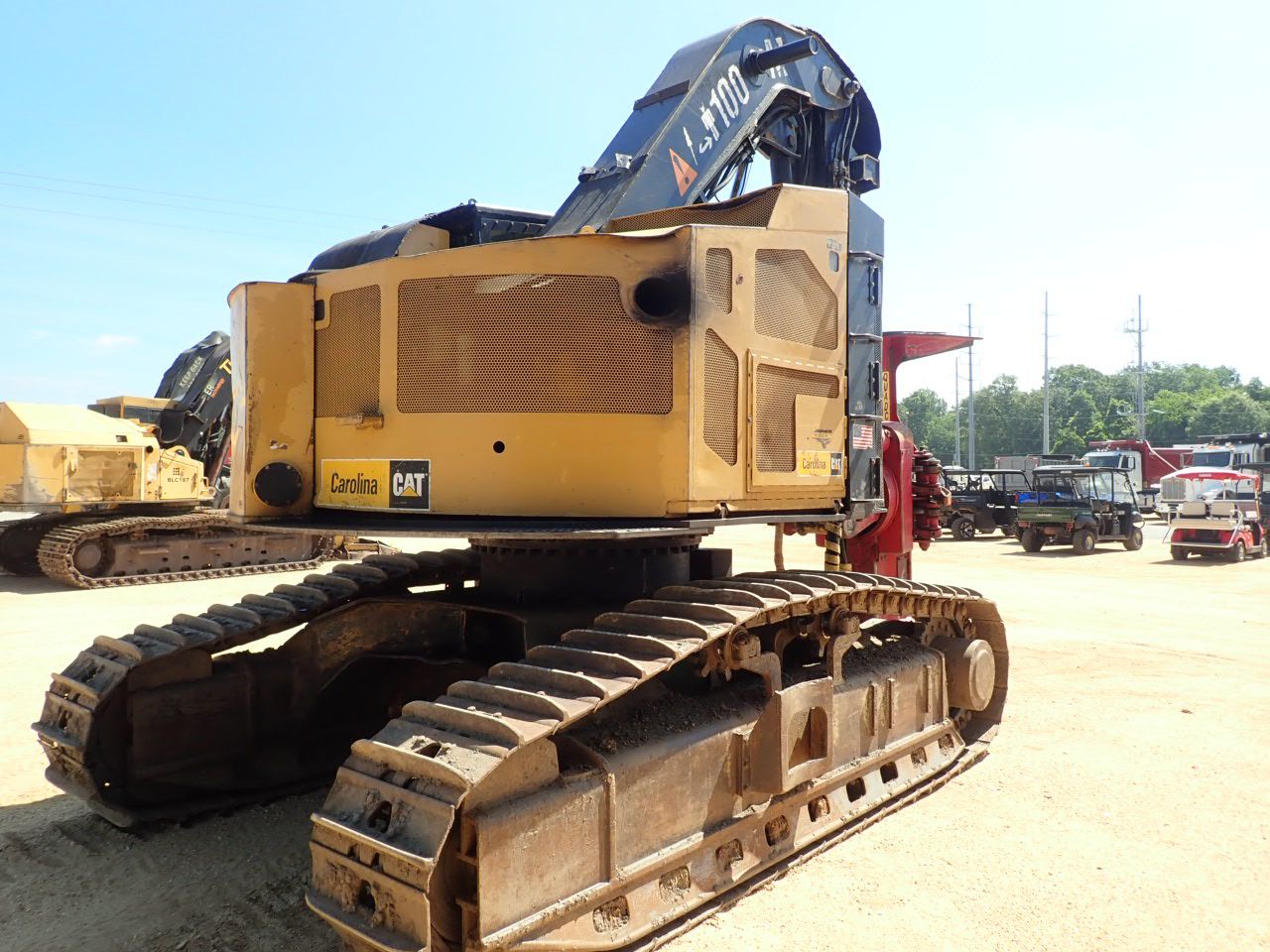 Cat 511 2010 CAT 521 TRACK Feller Buncher - J.M. Wood Auction Company, Inc.