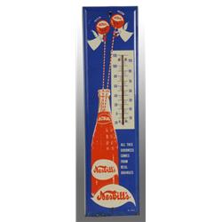 Embossed Tin Nesbitt's Orange Soda Thermometer.