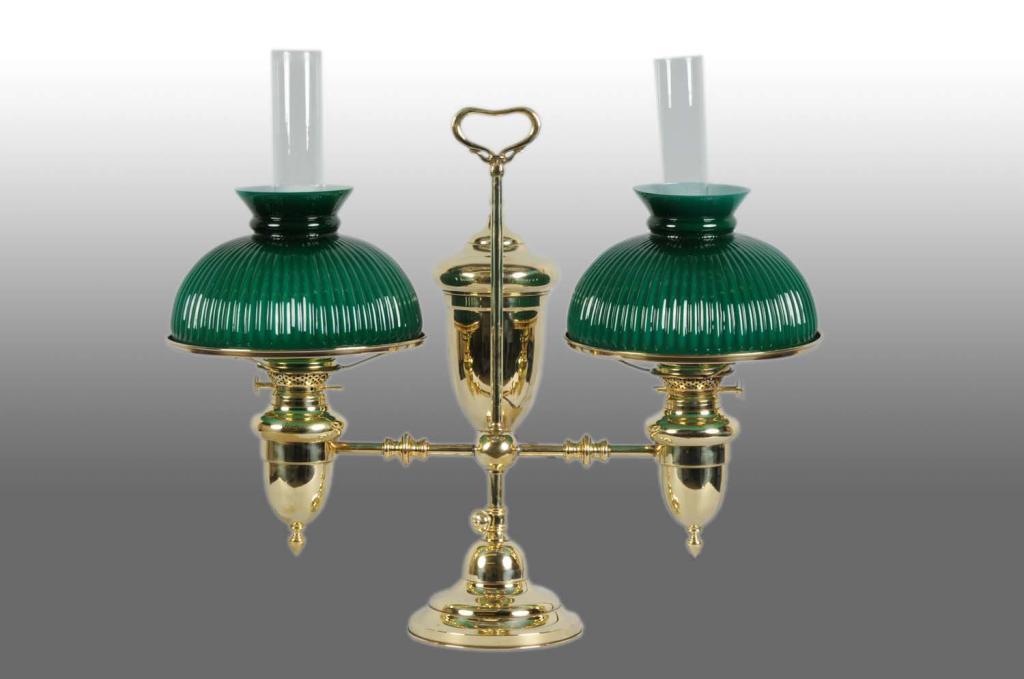 brass lamp with green glass shade