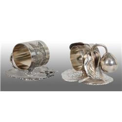 Lot of 2: Figural Napkin Rings.