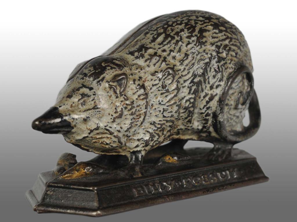 Cast Iron Billy Possum Still Bank.