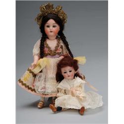 Lot of 2: Small Bisque-head Dolls.