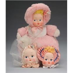 Musical Cloth Doll with 2 Cloth Heads.