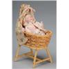 Image 1 : All-Bisque Bye-Lo Baby Doll in Wicker Bassinet.