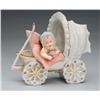 Image 1 : Bisque Figurine of Baby in Carriage.