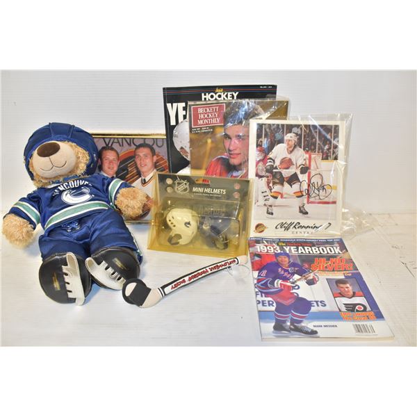LOT OF HOCKEY MEMORABILIA  INCLUDES MINI HELMETS