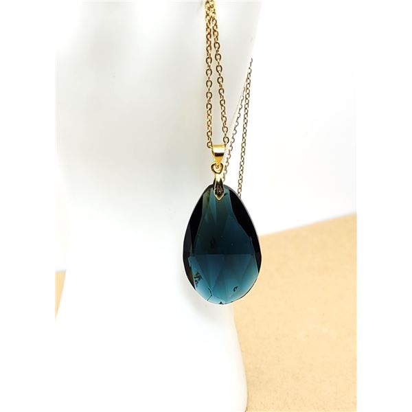 13)  BLUE TEAR DROP CRYSTAL PENDANT SET IN