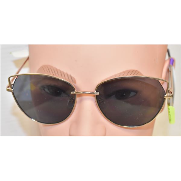 PAIR OF NEW FOSTER GRANT SUNGLASSES.