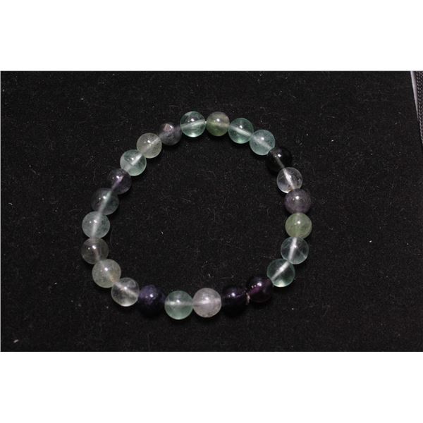 #339-NATURAL FLOURITE BEAD BRACELET 7.5"