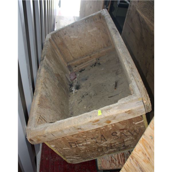 INSURANCE CLAIM: LARGE WOODEN CRATE ON CASTORS.