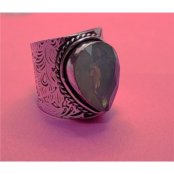 11)  LAB CREATED PALE GREEN OPAL TEAR DROP SHAPED