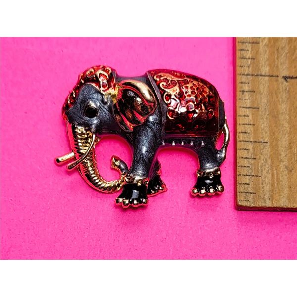 31)  GOLD TONE WITH GREY, RED & BLACK ENAMEL