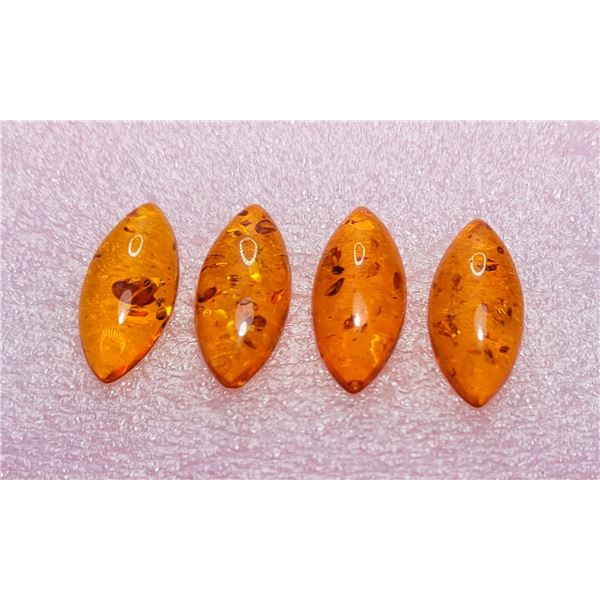 12)  LOT OF 4 LAB CREATED BALTIC AMBER GEMSTONES