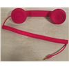 Image 1 : BOX WITH BRIGHT PINK CELL PHONE HAND-HELD