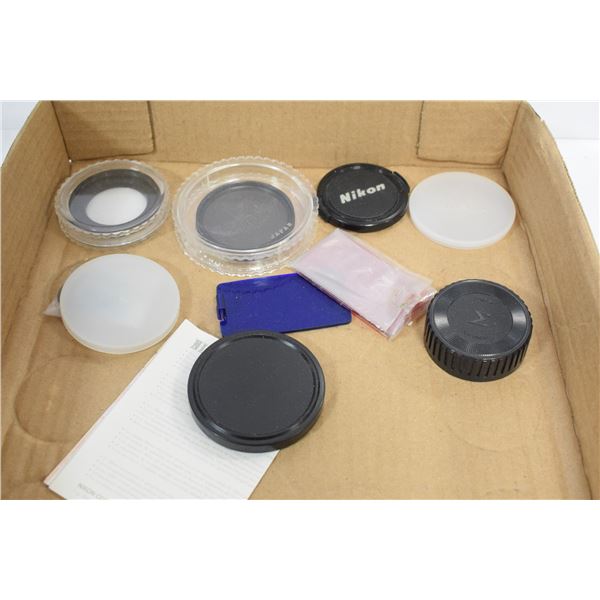 ASSORTED LENS CAPS AND FILTERS.