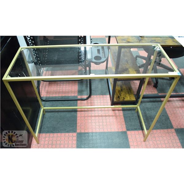 NEWLY ASSEMBLED GLASS AND METAL COUCH TABLE