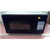 Image 1 : Small GE microwave untested