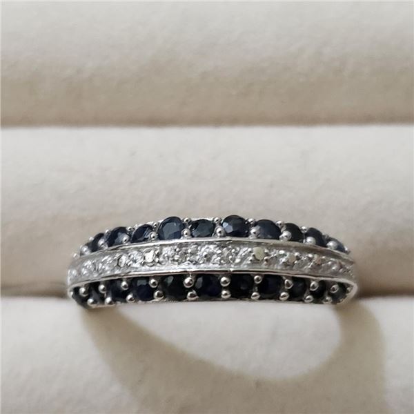 Silver Blue Sapphire And White Topaz(0.9ct) Ring, Suggested Retail Value $150