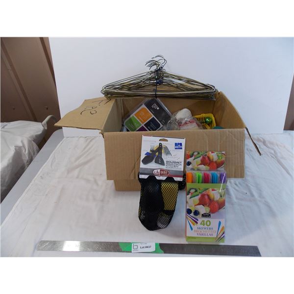 box of household items, coat hangers, RCMP souvenir pencil, backpack kitchen