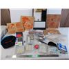 Image 1 : car eyelashes, shoe stretcher, various soaps, wood burning kit pieces, noisemakers, mosquito coils, 